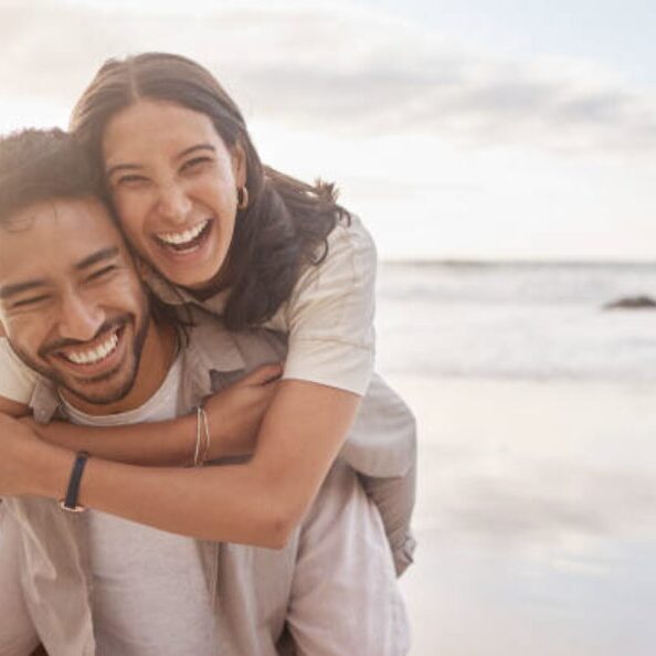 happy couple at the beach